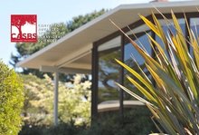 building exterior surrounded by plants