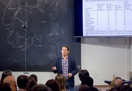 Eric Klinenberg speaking to an audience